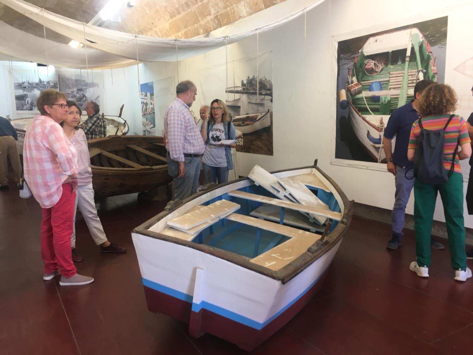 Group of people visit the headquarters of the Maritime Museum in Palma.